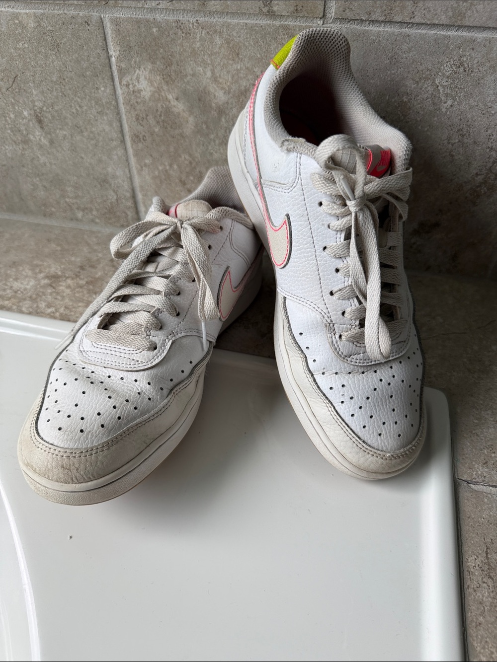 Nike White Leather Low-Top Sneakers with Pink Swoosh